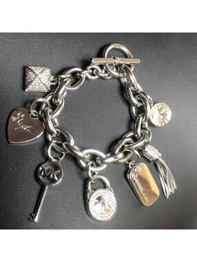6324 Michael Kors silvertone Crystal Key tassl MK logo charm Bracelet Toggle 8"